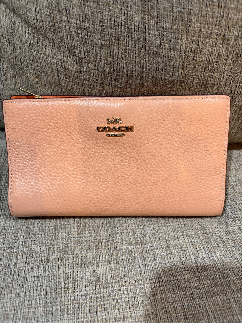 Coach Peach Pebbled Leather Zip Wallet with Gold Logo